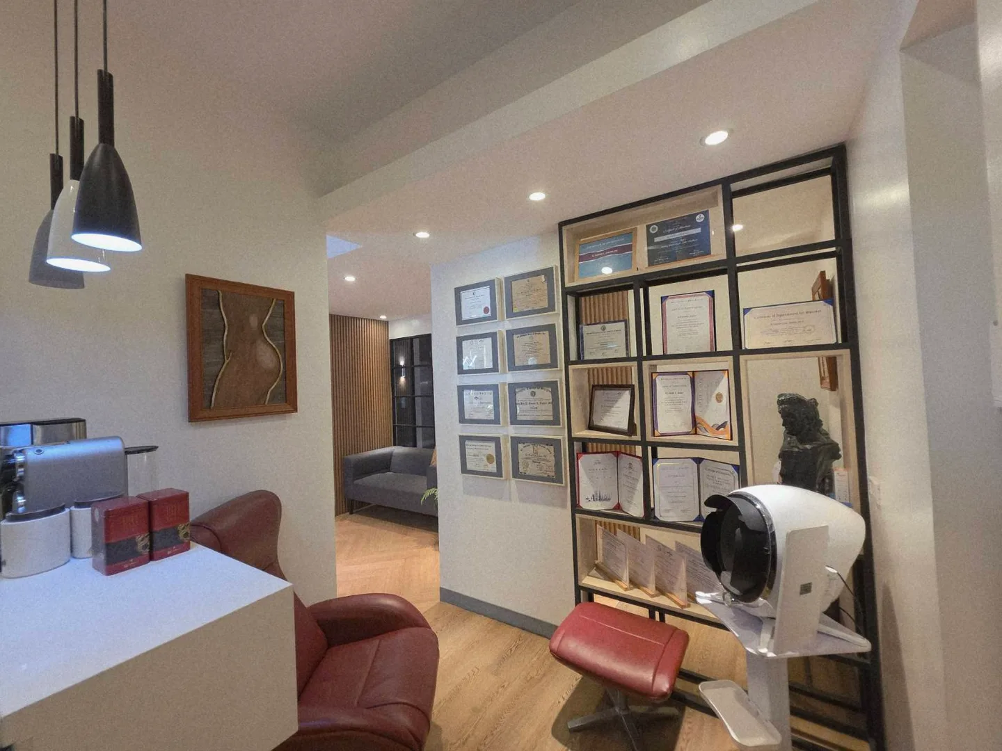 Framed certifications on display at NEU Advanced Aesthetics Center